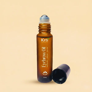 Front view of Krti Herbals Eyebrow Growth Oil Roll-On showing packaging and label clearly
